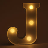 J letter shaped light from Hamster London for decoration purposes. it is a must have product for parties and kids bday party.